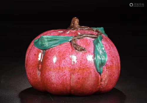 A QING DYNASTY ROUGE GLAZE BIONIC PUMPKIN ORNAMENT