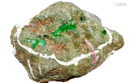 A BURMESE GREEN JADEITE STONE, A CLASS