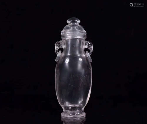 A CRYSTAL CARVED BOTTLE VASE