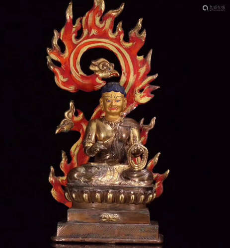 A TIBETAN BRONZE CASTED IMMOBILE KING BUDDHA