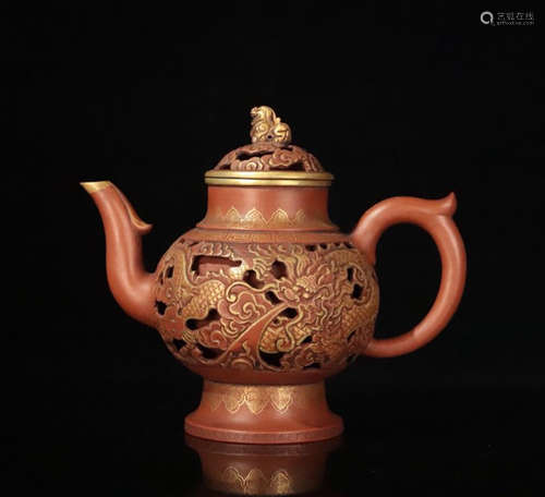 A ZISHA GILD HOLLOW PATTERN TEA POT