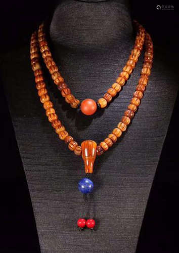 A TIBETAN LING BONZE BEAD STRING NECKLACE