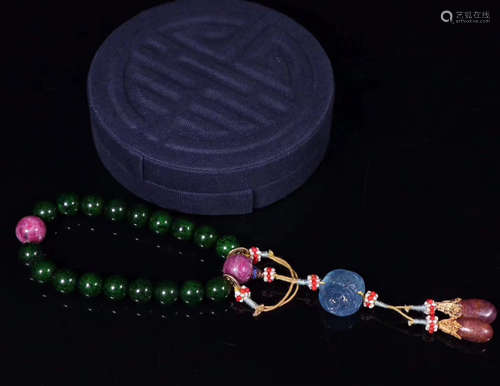 A QIUJIAO BEADS STRING BRACELET