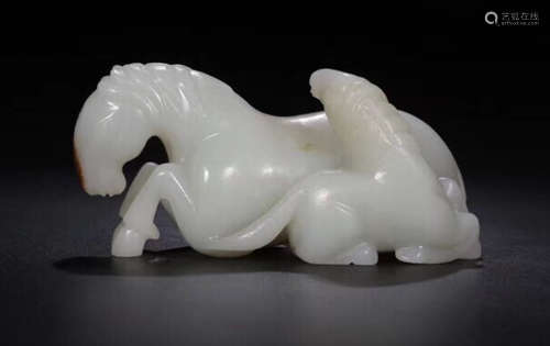 A HETIAN JADE CARVED HORSE SHAPED PENDANT