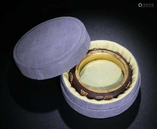 A CHENXIANG WOOD WITH GILT SILVER BANGLE