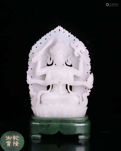 A HETIAN JADE CARVED BUDDHA FIGURE