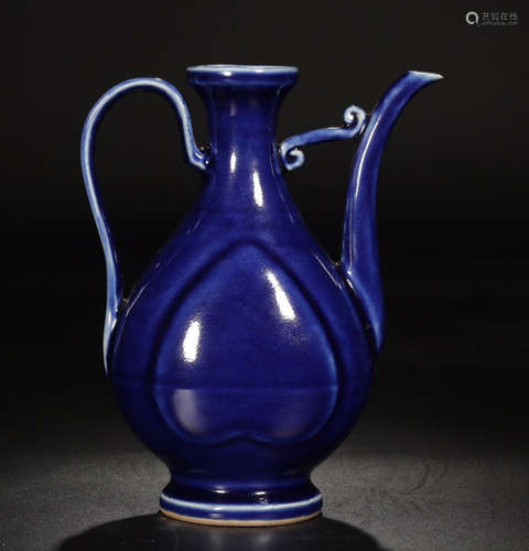 A BLUE GLAZE HOLDER BOTTLE