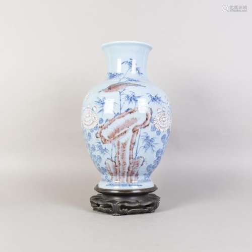 A COPPER-RED BLUE GROUND GLAZED BALUSTER VASE, MID-QING
