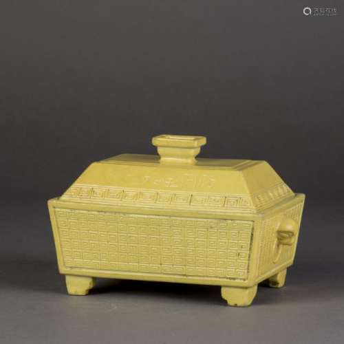 A YELLOW-GLAZED SCROLL PATTERN PORCELAIN CENSER WITH