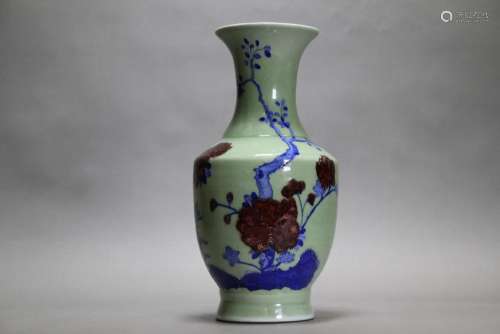 A BLUE AND WHITE AND IRON RED VASE
