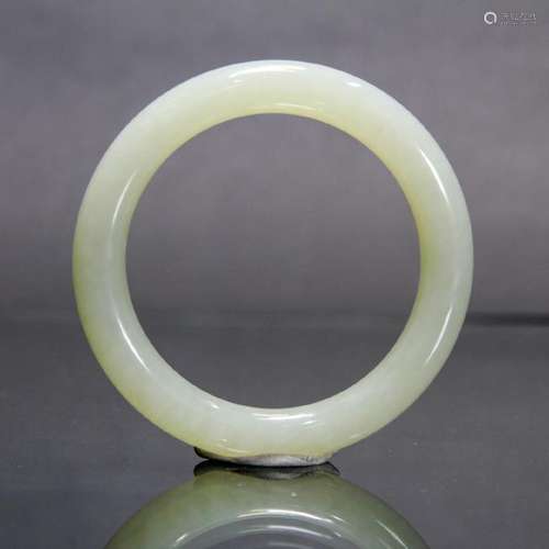 A WHITE JADE BANGLE