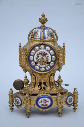 A bronze clock with porcelain