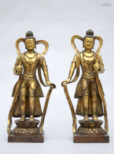 Pair of gilded Buddhistic statues