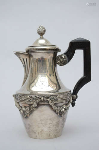 A silver coffee pot