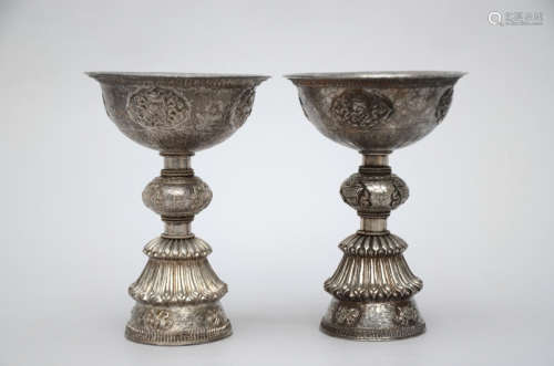 Pair of silver Tibetan butter lamps