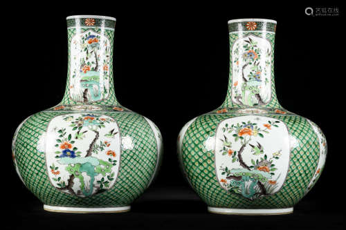 A pair of Chinese famille verte vases 'floral scene'