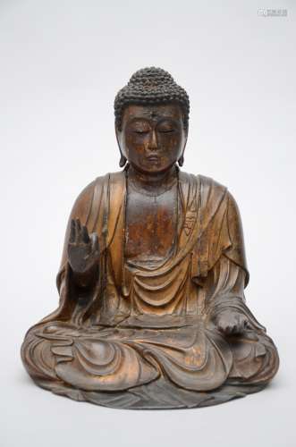 A Japanese buddha in laquered wood