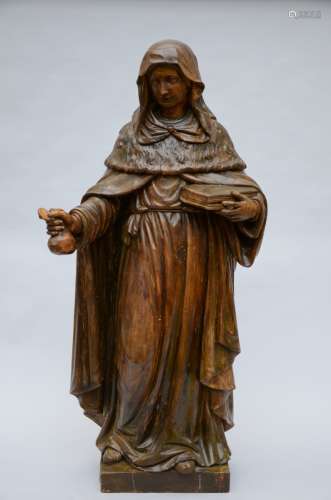 A large statue in wood 'a saint'
