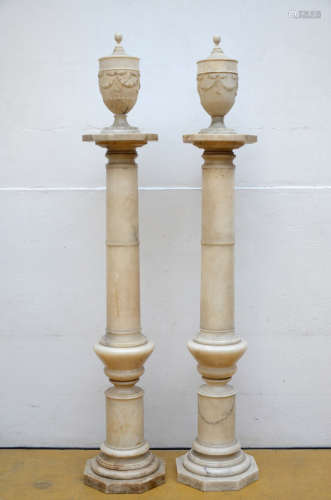 Pair of alabaster columns with vases, 19th century