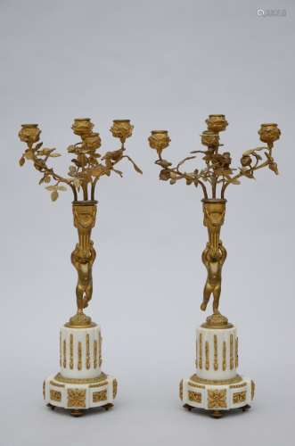 Pair of bronze candlesticks 'amours'