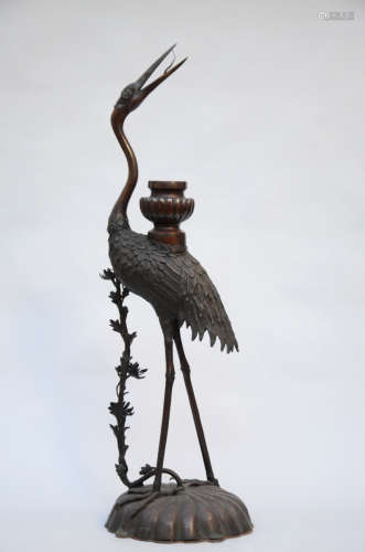 A Japanese bronze sculpture of a crane