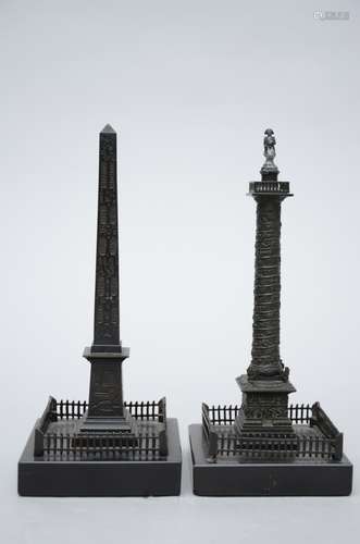 Two bronze obelisks