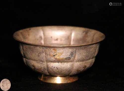 A GILT SILVER AND GOLD BOWL