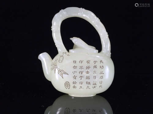 A HETIAN JADE CARVED POETRY PATTERN TEA POT