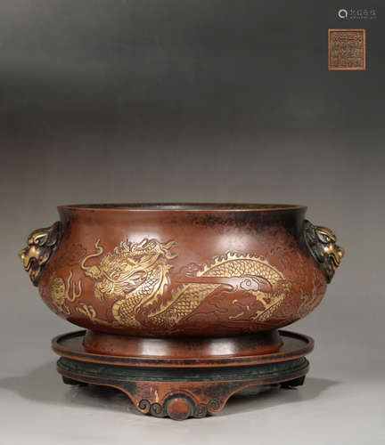 A BRONZE CASTED DRAGON AND PHOENIX PATTERN CENSER