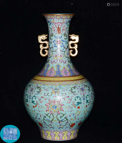 A FAMILLE ROSE GILD WRAPPED LOTUS PATTERN VASE