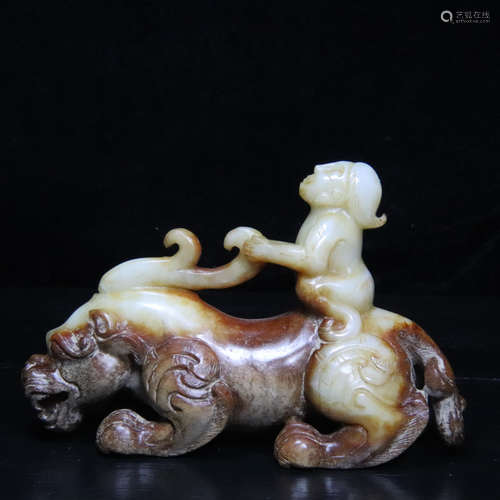 AN OLD JADE CARVED BEAST SHAPED PENDANT