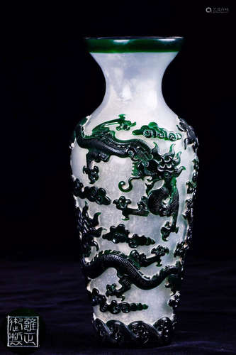 A GLASS CASTED DRAGON PATTERN VASE