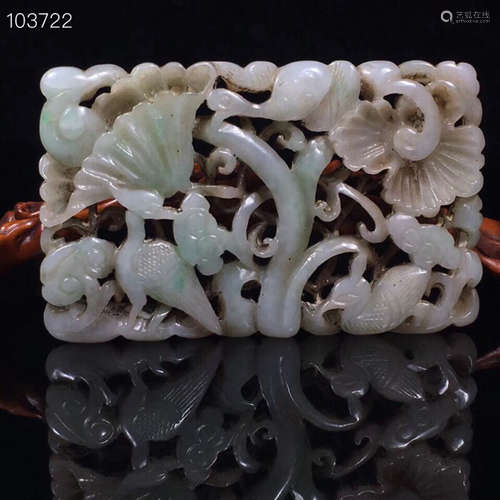 A GREEN JADE CARVED AUSPICIOUS PATTERN PENDANT