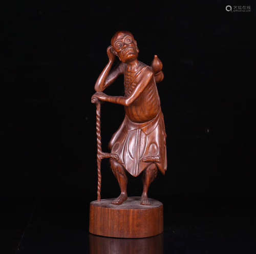 A OLD ZITAN WOOD CARVED LUOHAN FIGURE