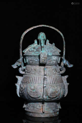 16TH CENTURY BC, A BRONZE LIFTING HANDLE POT, SHANG DYNASTY