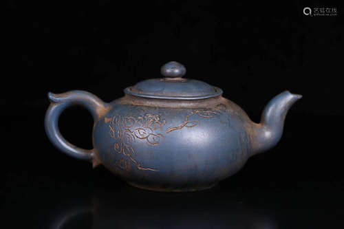 19TH CENTURY, A FLORIAL DESIGN COLOURED PURPLE CLAY TEAPOT, COUNTERACTION PERIOD