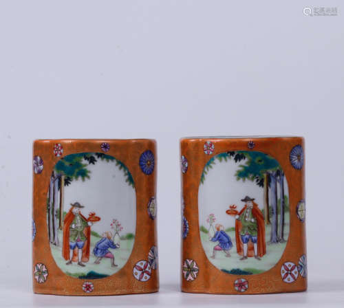 A PAIR OF STORY DESIGN RED GLAZED BRUSH POTS