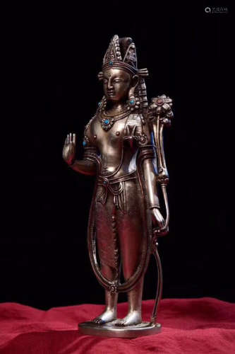A FINE SILVER STANDING BUDDHA