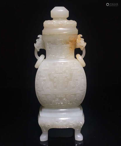 A WHITE JADE CARVED TAOTIE PATTERN VASE