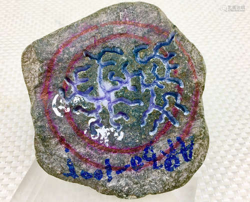 A BURMESE PURPLE JADEITE STONE, A CLASS