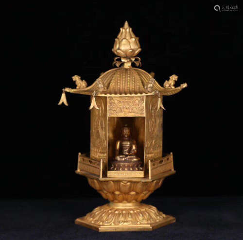 A GILT BRONZE MOLDED BUDDHIST CONTAINER