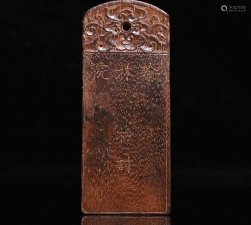 A CHENXIANG WOOD CARVED PENDANT