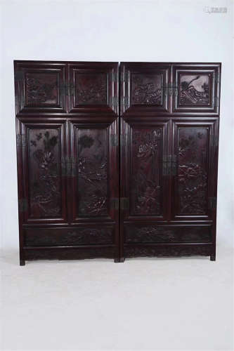 A PAIR OF LUTUS PATTERN ROSEWOOD CABINETS