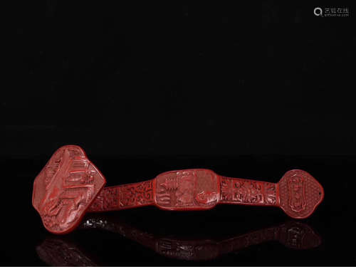 AN OLD RED PAINTED RUYI ORNAMENT
