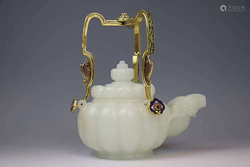 AN OLD TIBETAN HETIAN JADE LIFTING-HANDLE TEAPOT