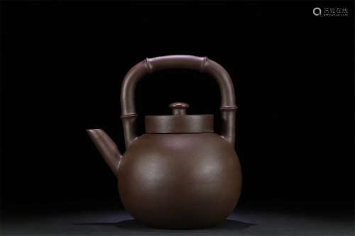 AN OLD BAMBOO HANDLE DESIGN PURPLE CLAY TEAPOT