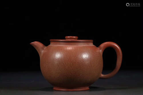 A FLAT COVER PURPLE CLAY TEAPOT