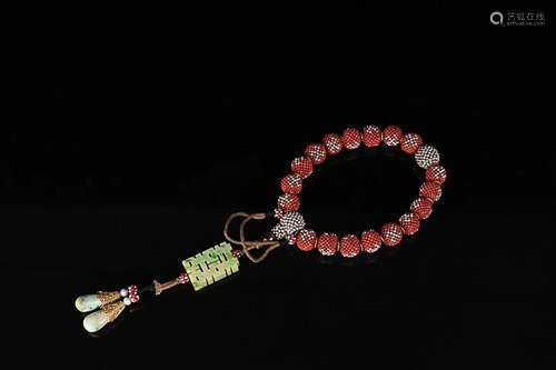 AN OLD TIBETAN CORAL BRACELET