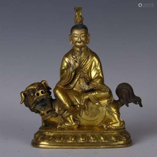 CHINESE GILT BRONZE SEATED BUDDHA ON LION