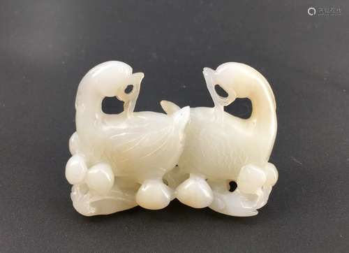 A nice carved white jade double goose figure